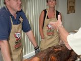 081290 : Client, Nikki and Larry Clark, People, food, roasted pig, wedding